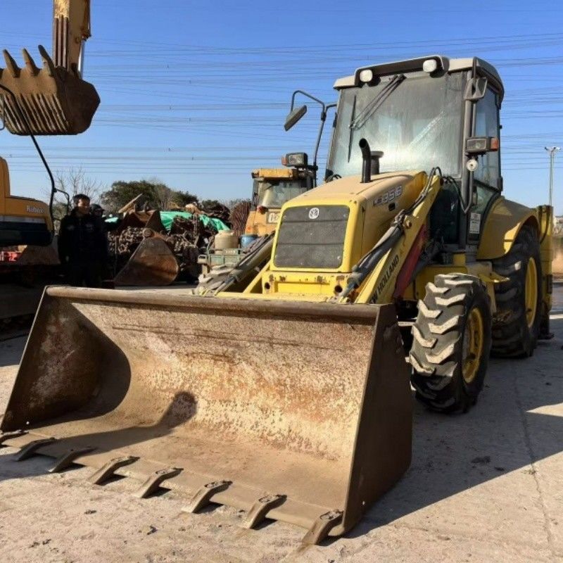 رنگ اصلی New Holland Loader Backhoe LB85 تراکتور صنعتی